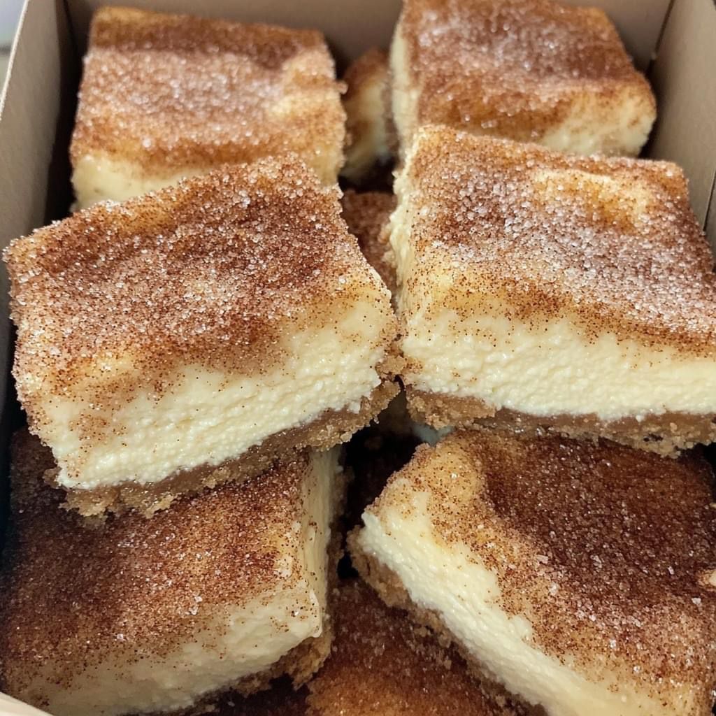 Cinnamon Sugar Churro Cheesecake Bars